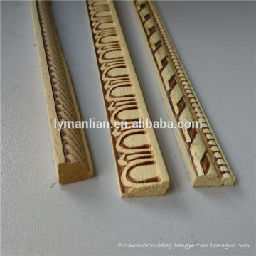 Decorative strips embossed wood mouldings